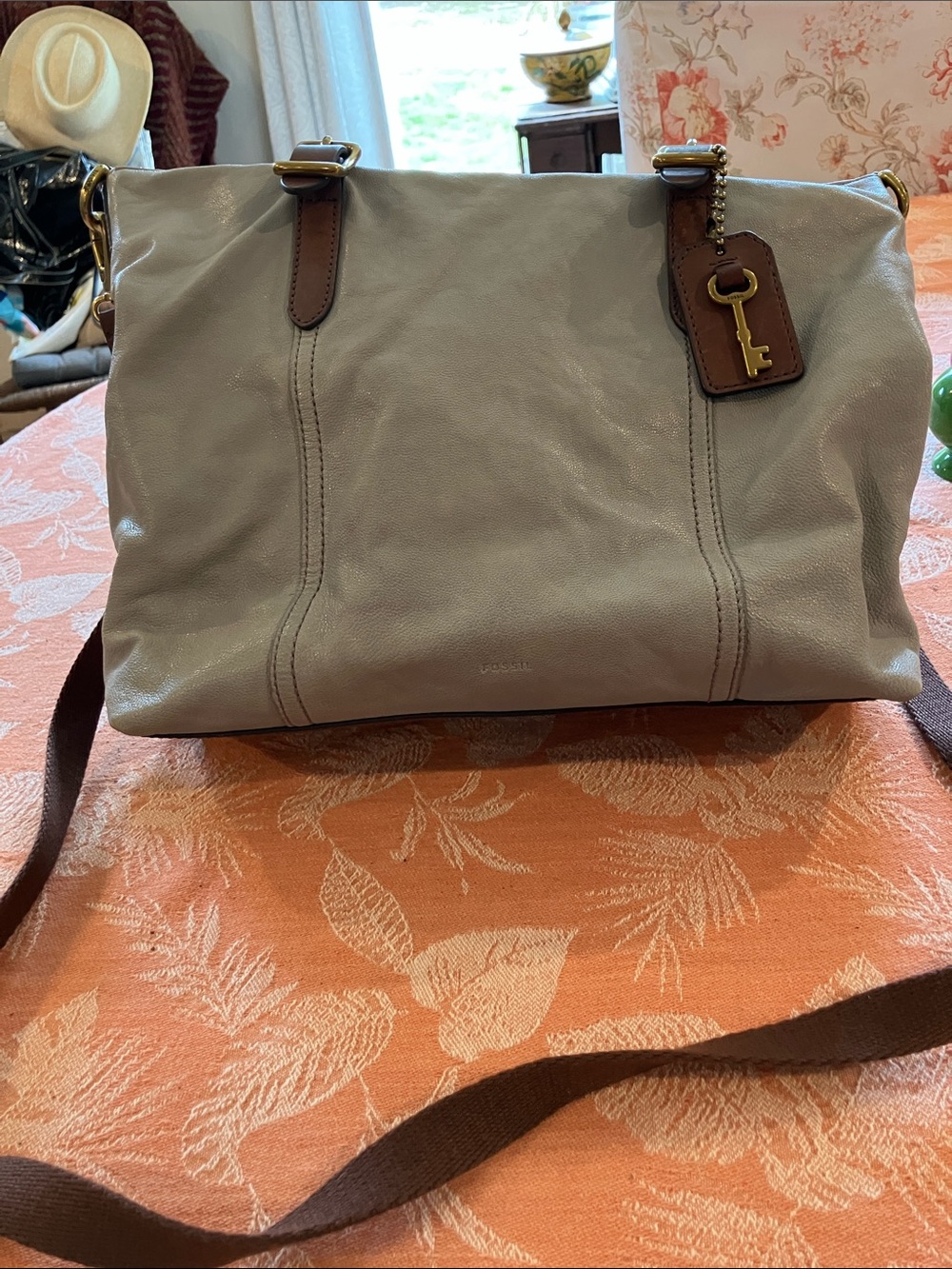 Fossil Light Gray Leather Crossbody with Brown Trim and Key Charm